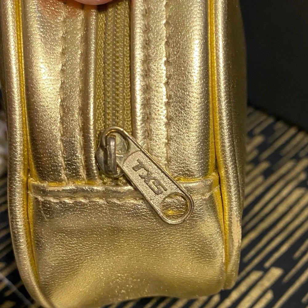 DIOR GOLD ZIPPER POUCH